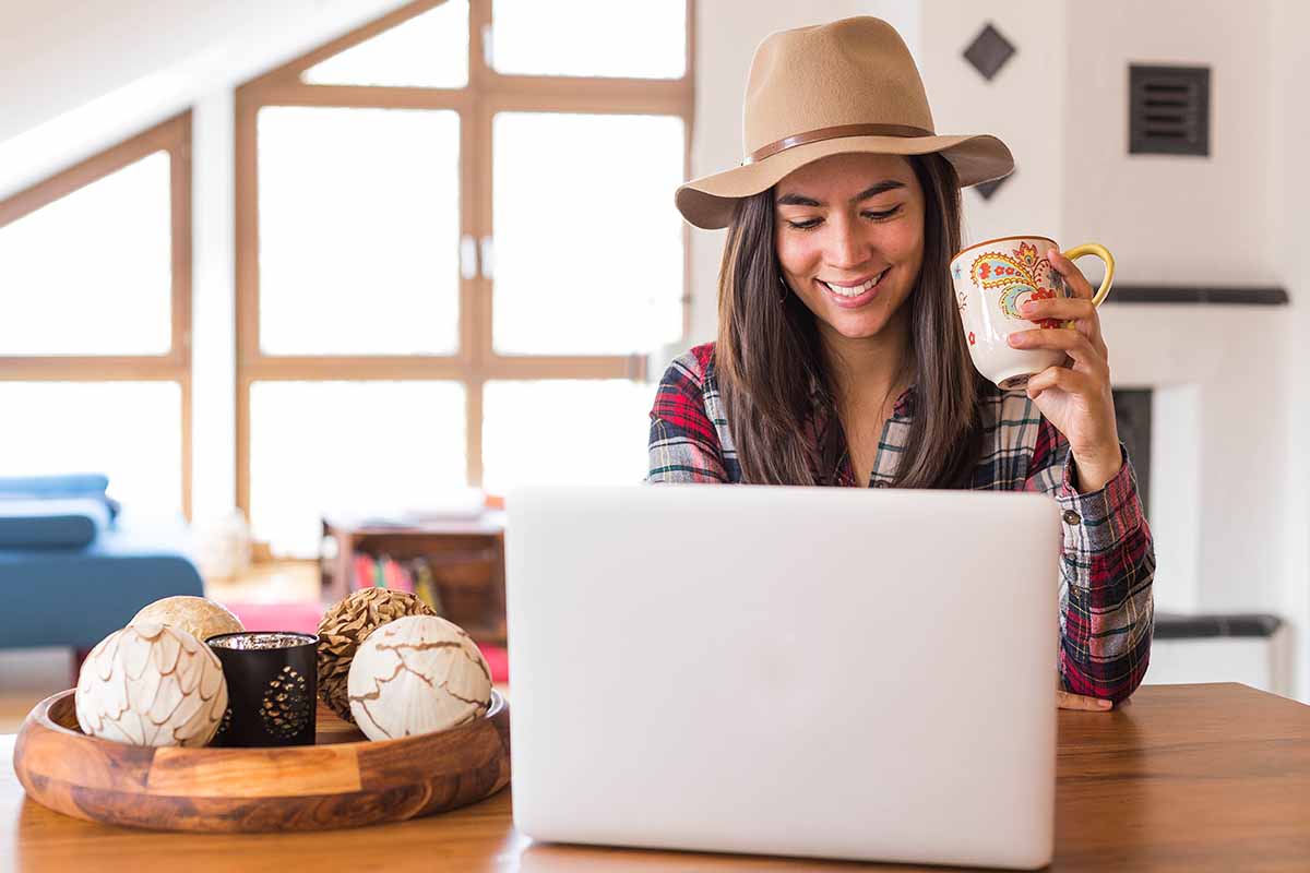 young-woman-having-a-coffee-and-working-at-home_t20_1j9png pin